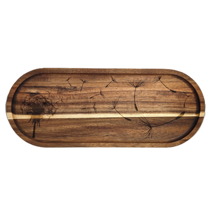 Wooden tray with dandelion seed design on a white background