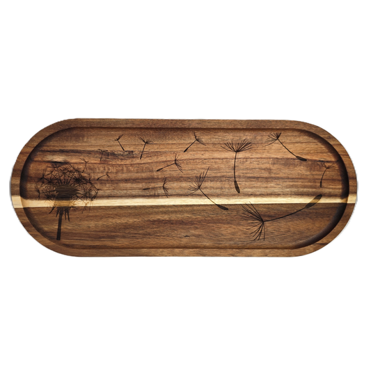 Wooden tray with dandelion seed design on a white background