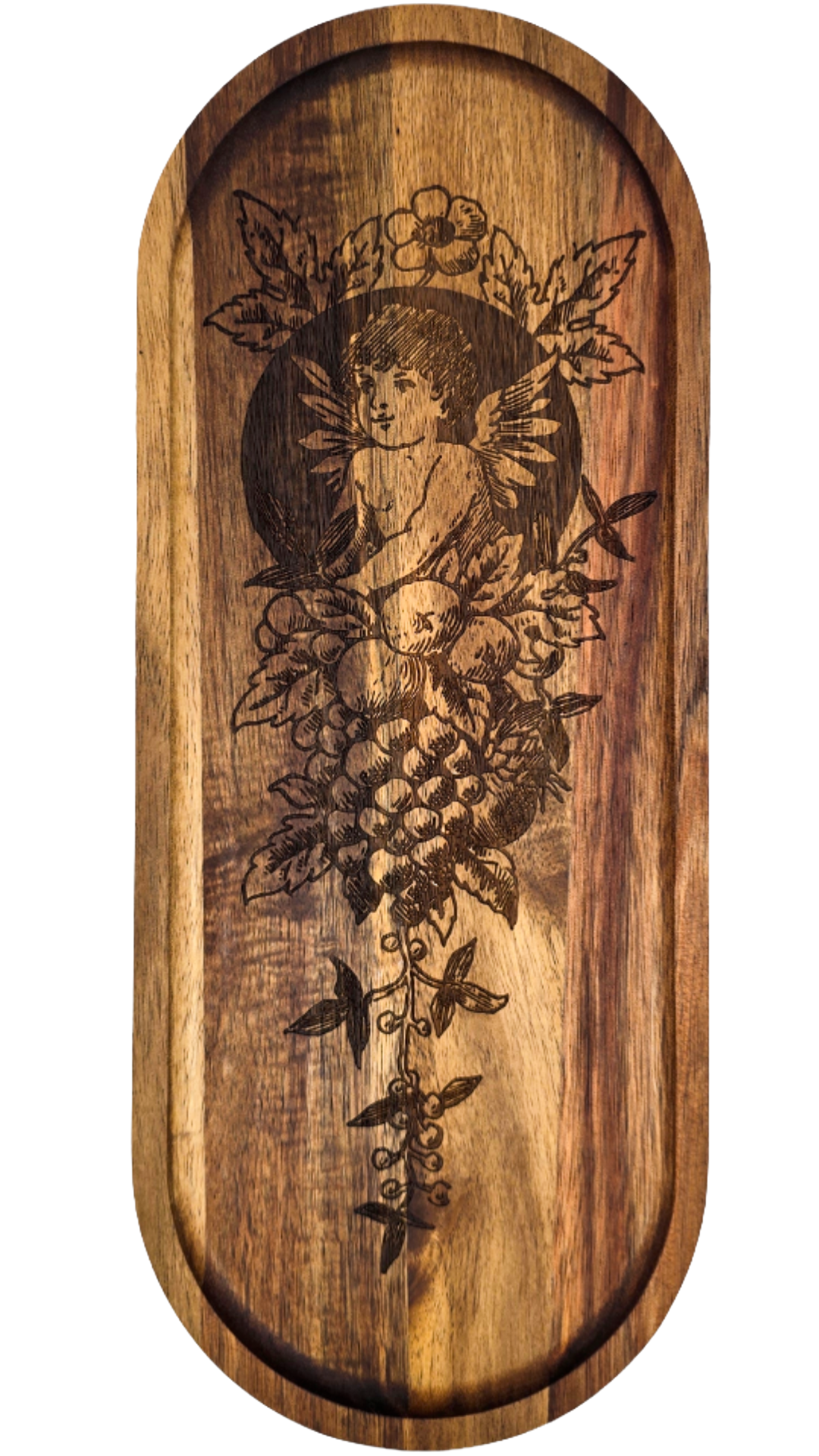 Wooden tray with engraved design of a cherub surrounded by leaves and flowers on a white background